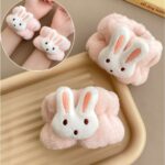 2 MUÑEQUERAS DE CONEJITO