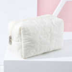 COSMETIQUERA BORDADO FLORAL DE HILO