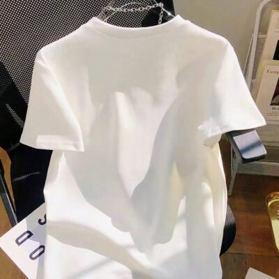 CAMISETA CON ADORNOS DE RHINESTONE